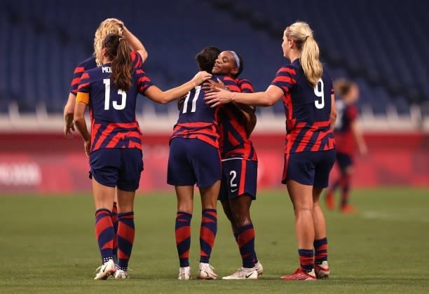 Christen Press of Team United States celebrates with team mates after scoring their side's fourth goal during the Women's First Round Group G match...