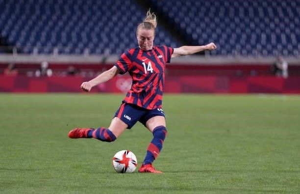 Emily Sonnett of the United States crosses a ball during a game between New Zealand and USWNT at Saitama Stadium on July 24, 2021 in Saitama, Japan.