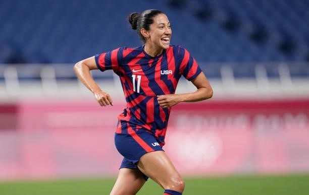 Christen Press of the United States scores and celebrates during a game between New Zealand and USWNT at Saitama Stadium on July 24, 2021 in Saitama,...