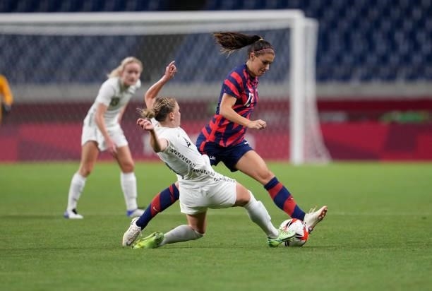 Alex Morgan of the United States moves with the ball during a game between New Zealand and USWNT at Saitama Stadium on July 24, 2021 in Saitama,...