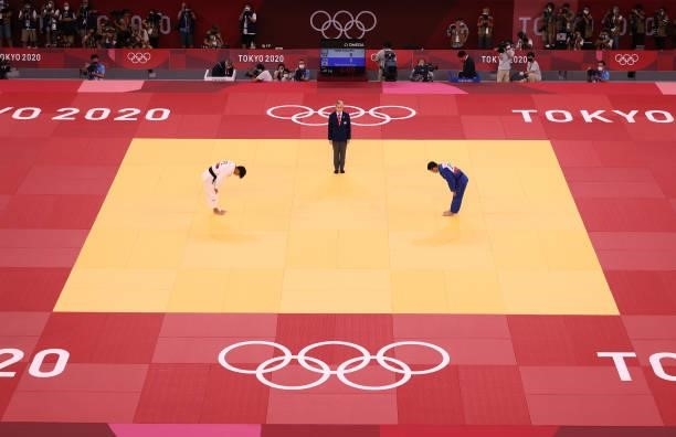 Naohisa Takato of Team Japan and Wei Yung Yang of Chinese Taipei bow to each other before their gold medal match in the Men’s Judo 60kg Final at the...