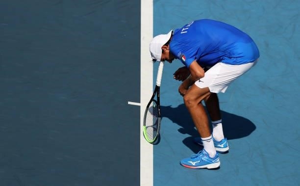 Lorenzo Sonego of Team Italy shows his frustration during his Men's Singles First Round match against Taro Daniel of Team Japan on day one of the...