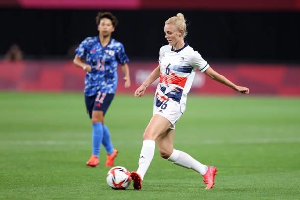 Sophie Ingle of Team Great Britain passes the ball during the Women's First Round Group E match between Japan and Great Britain on day one of the...