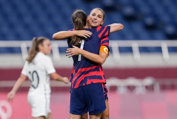 Alex Morgan of the United States scores and celebrates during a game between New Zealand and USWNT at Saitama Stadium on July 24, 2021 in Saitama,...