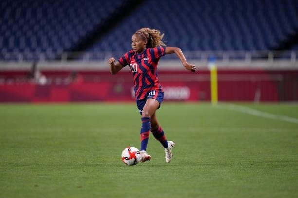 Casey Krueger of the United States moves with the ball during a game between New Zealand and USWNT at Saitama Stadium on July 24, 2021 in Saitama,...
