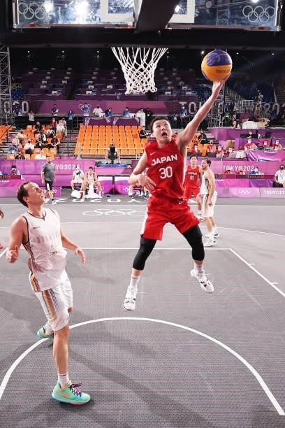 Keisei Tominaga of Team Japan drives to the basket during the Men's Pool Round match between Belgium and Japan on day one of the Tokyo 2020 Olympic...
