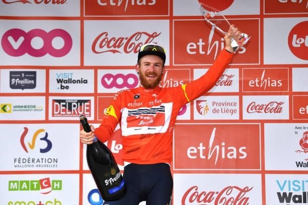 Quinn Simmons of United States and Team Trek - Segafredo Orange Leader Jersey celebrates at podium as Final GC winner during the 42nd Tour de...