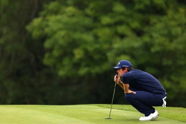 Nacho Elvira of Spain lines up his putt on the 15th hole during Day Three of the Cazoo Open supported by Gareth Bale at Celtic Manor Resort on July...
