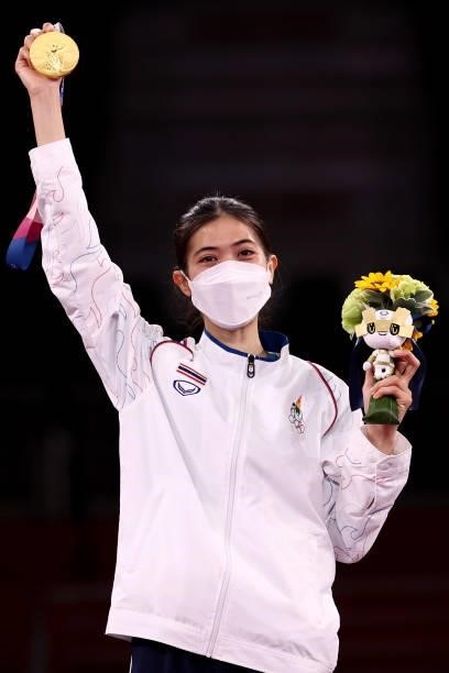 Gold medalist Panipak Wongpattanakit of Team Thailand poses with the gold medal for the Women's -49kg Taekwondo Gold Medal contest on day one of the...