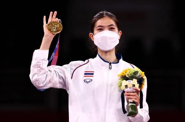 Gold medalist Panipak Wongpattanakit of Team Thailand poses with the gold medal for the Women's -49kg Taekwondo Gold Medal contest on day one of the...
