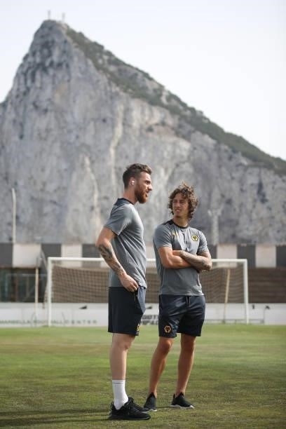 Jose Sa and Fabio Silva of Wolverhampton Wanderers speak during a pitch inspection in front of the Rock of Gibraltar prior to the Pre-Season Friendly...