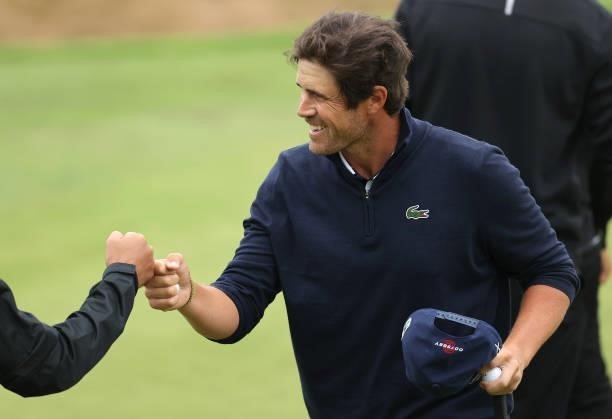 Nacho Elvira of Spain acknowledges his playing partners on the 18th green during the third round of the Cazoo Open supported by Gareth Bale at Celtic...