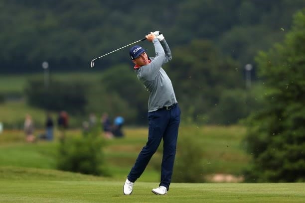 Chase Hanna of USA plays his second shot on the 12th hole during Day Three of the Cazoo Open supported by Gareth Bale at Celtic Manor Resort on July...