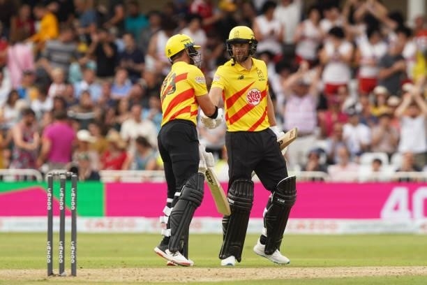 Arcy Short and Dawid Malan of Trent Rockets celebrate victory during The Hundred game between Trent Rockets and Southern Brave at Trent Bridge on...