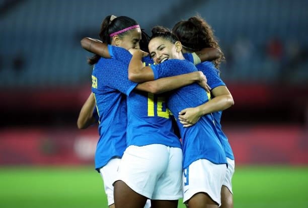 Ludmila of Team Brazil celebrates with Debinha after scoring their side's third goal during the Women's First Round Group F match between Netherlands...