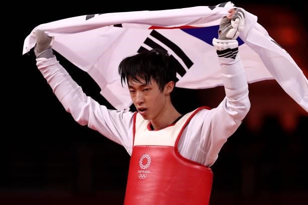 Jang Jun of Team South Korea celebrates after defeating Omar Salim of Team Hungary during the Men's -58kg Taekwondo Bronze Medal contest on day one...