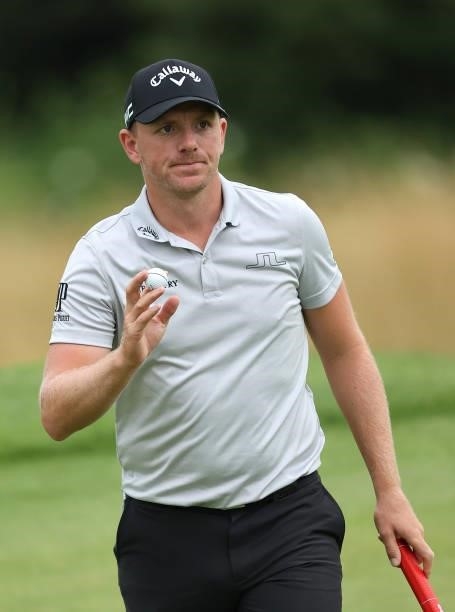 Matt Wallace of England acknowledges the crowd on the 18th green during the third round of the Cazoo Open supported by Gareth Bale at Celtic Manor...