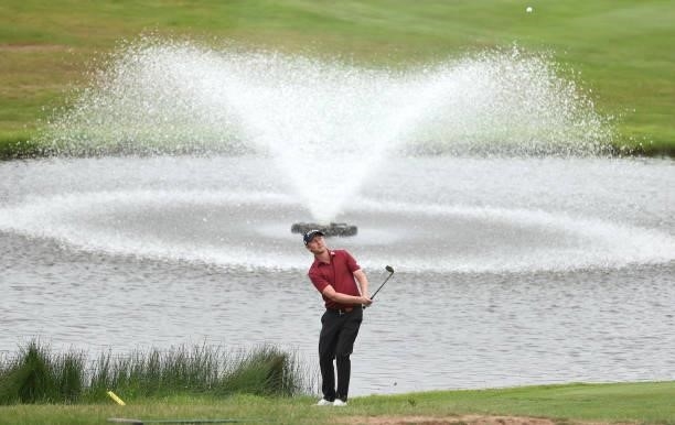 Justin Harding of South Africa chips onto the 18th green during the third round of the Cazoo Open supported by Gareth Bale at Celtic Manor Resort on...