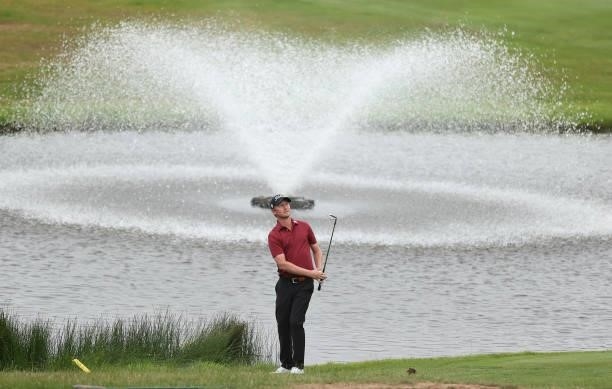 Justin Harding of South Africa chips onto the 18th green during the third round of the Cazoo Open supported by Gareth Bale at Celtic Manor Resort on...