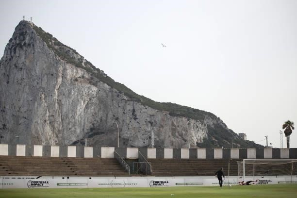 General view inside the stadium where the Rock of Gibraltar is seen during the warm up prior to the Pre-Season Friendly match between Real Betis and...
