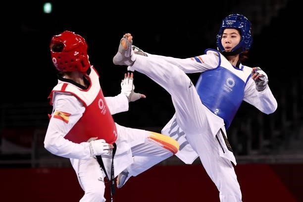 Panipak Wongpattanakit of Team Thailand competes against Adriana Cerezo Iglesias of Team Spain during the Women's -49kg Taekwondo Gold Medal contest...