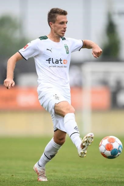 Patrick Hermann of Moenchengladbach runs with the ball at Borussia-Park on July 24, 2021 in Moenchengladbach, Germany.