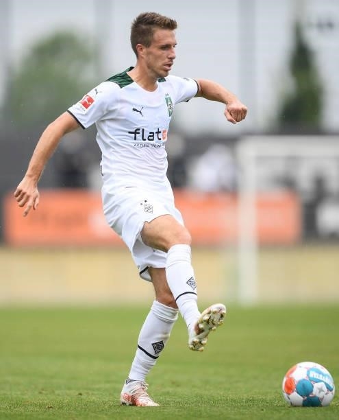 Patrick Hermann of Moenchengladbach runs with the ball at Borussia-Park on July 24, 2021 in Moenchengladbach, Germany.