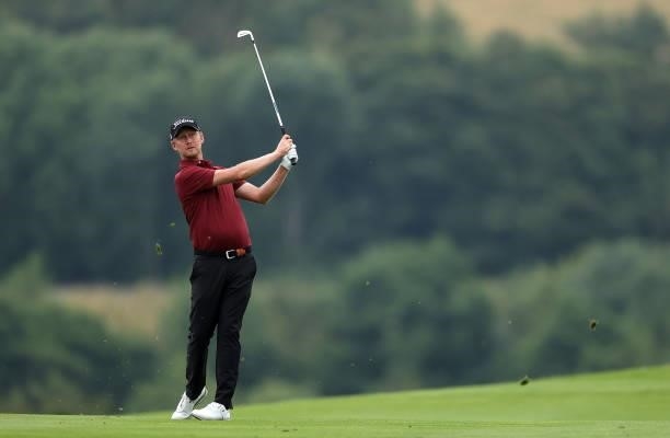 Justin Harding of South Africa plays his second shot on the 16th hole during the third round of the Cazoo Open supported by Gareth Bale at Celtic...