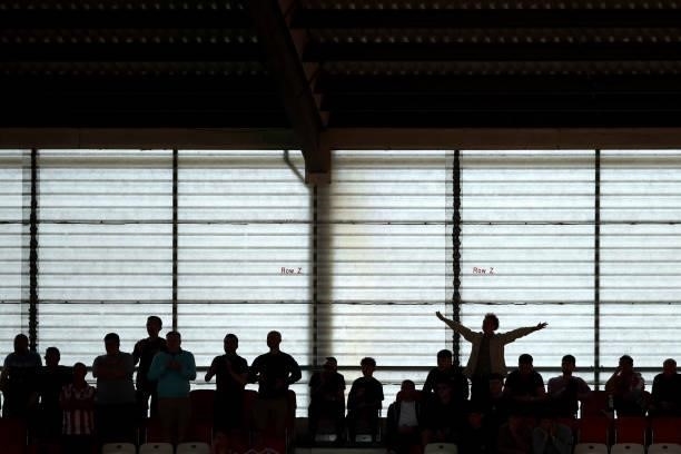 Stoke City fans cheer during a pre-season friendly match between Stoke City and Aston Villa at Britannia Stadium on July 24, 2021 in Stoke on Trent,...