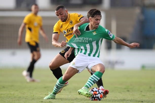 Rodri of Real Betis is challenged by Marcal of Wolverhampton Wanderers during the Pre-Season Friendly match between Real Betis and Wolverhampton...