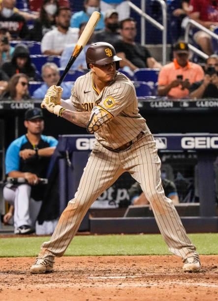 Manny Machado of the San Diego Padres bats against the Miami Marlins at loanDepot park on July 23, 2021 in Miami, Florida.