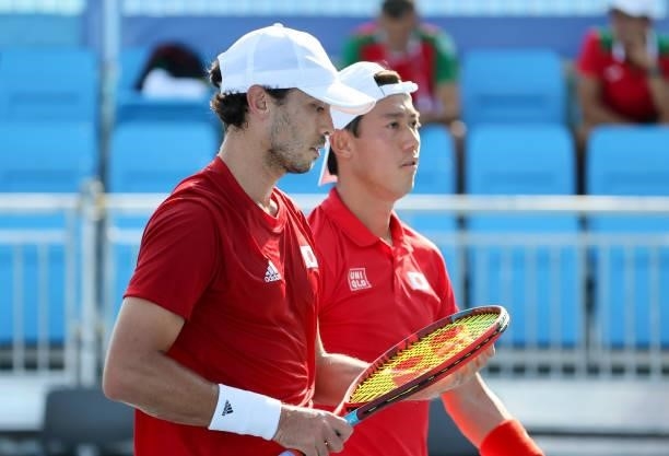 Kei Nishikori and Ben McLachlan of Japan during day one of the Tokyo 2020 Olympic Games at Ariake Tennis Park on July 24, 2021 in Tokyo, Japan.