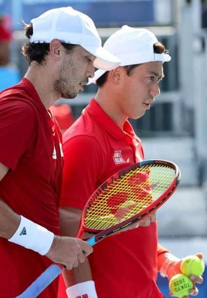 Kei Nishikori and Ben McLachlan of Japan during day one of the Tokyo 2020 Olympic Games at Ariake Tennis Park on July 24, 2021 in Tokyo, Japan.