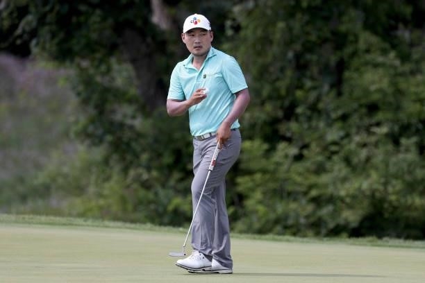 Sung Kang of South Korea reacts after making par on the first green during the Third Round of the 3M Open at TPC Twin Cities on July 24, 2021 in...