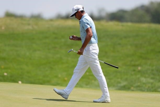 Rickie Fowler reacts after making par on the 12th green during the Third Round of the 3M Open at TPC Twin Cities on July 24, 2021 in Blaine,...