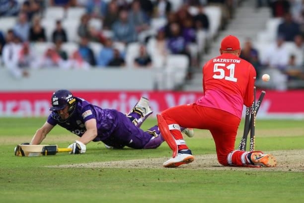 Tom Kohler-Cadmore of Northern Superchargers is run out by Jonny Bairstow of Welsh Fire during The Hundred Match between Northern Superchargers and...