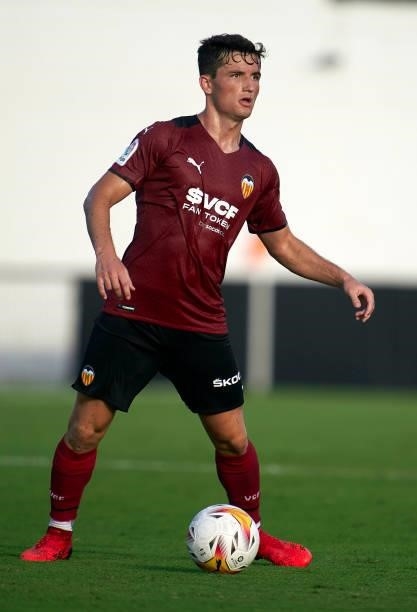 Hugo Guillamon of Valencia CF in action during the pre-season friendly match between Valencia CF and FC Cartagena at Antonio Puchades Stadium on July...