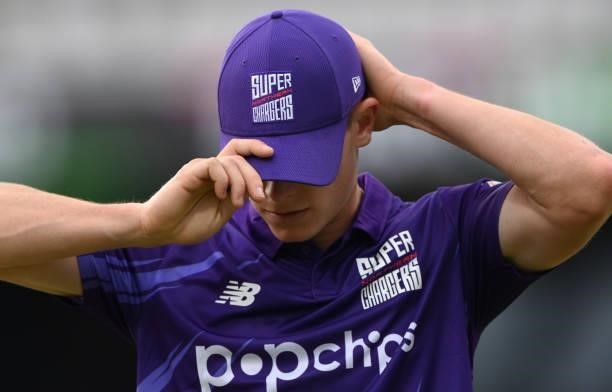 Detail picture of Superchargers bowler Matthew Potts adjusting his baseball cap during The Hundred match between Northern Superchargers Men and Welsh...