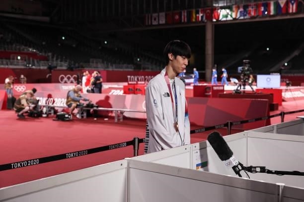 Bronze medalist Jang Jun of Team South Korea gives a statement after the bronze medal for the Men's -58kg Taekwondo Gold Medal on day one of the...