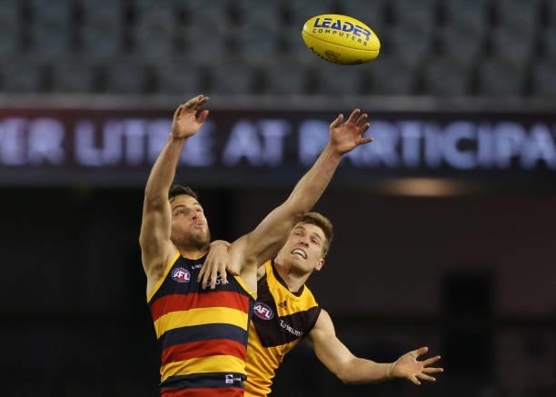 Brodie Smith of the Crows flys for a mark during the round 20 AFL match between Adelaide Crows and Hawthorn Hawks at Marvel Stadium on July 24, 2021...