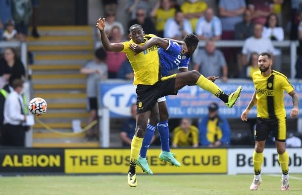 Lucas Akins of Burton Albion is challenged by Wilfred Ndidi of Leicester City during the Pre-Season Friendly match between Burton Albion and...