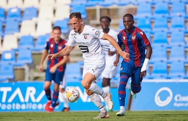 Flavien Tait of Stade Rennais runs with the ball during a Pre-Season friendly match between Levante UD and Stade Rennais at Pinatar Arena on July 24,...