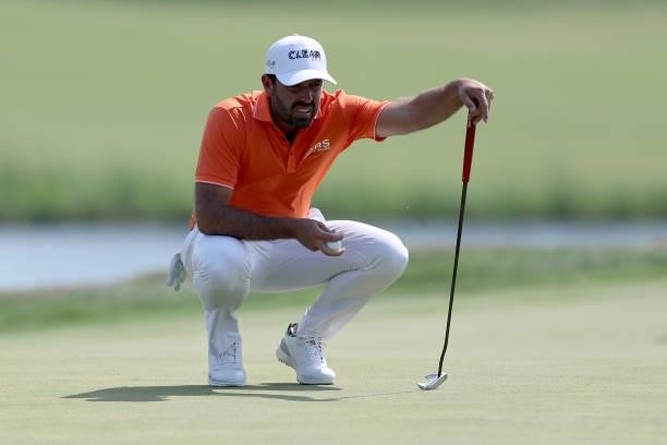 Charl Schwartzel of South Africa lines up a putt on the 17th green during the Third Round of the 3M Open at TPC Twin Cities on July 24, 2021 in...