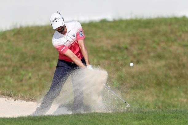Adam Hadwin of Canada plays his shot from the bunker on the 18th hole during the Third Round of the 3M Open at TPC Twin Cities on July 24, 2021 in...