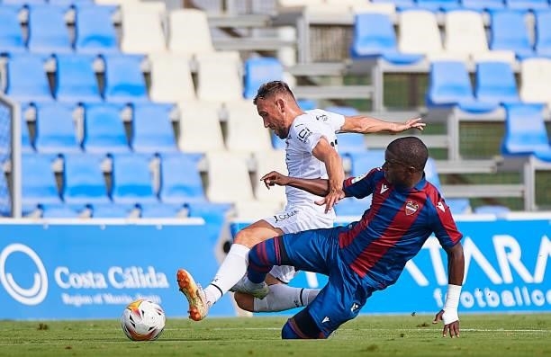 Mickael Malsa of Levante UD competes for the ball with Flavien Tait of Stade Rennais during a Pre-Season friendly match between Levante UD and Stade...