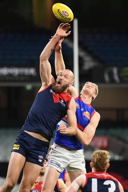 Max Gawn of the Demons and Tim English of the Bulldogs compete in the ruck during the round 20 AFL match between Melbourne Demons and Western...