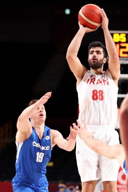 Behnam Yakhchalidehkordi of Team Iran shoots against Ondrej Sehnal of Team Czech Republic during the first half on day two of the Tokyo 2020 Olympic...