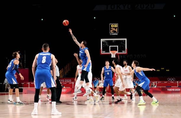 Ondrej Balvin of Team Czech Republic tips off against Islamic Republic of Iran during the first half on day two of the Tokyo 2020 Olympic Games at...