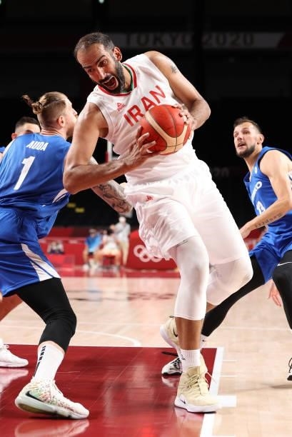 Hamed Haddadi of Team Iran drives to the basket around Patrik Auda of Team Czech Republic during the first half on day two of the Tokyo 2020 Olympic...