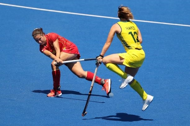 Clara Ycart Canal of Team Spain shoots the ball against Greta Hayes of Team Australia during the Women's Pool B match on day two of the Tokyo 2020...